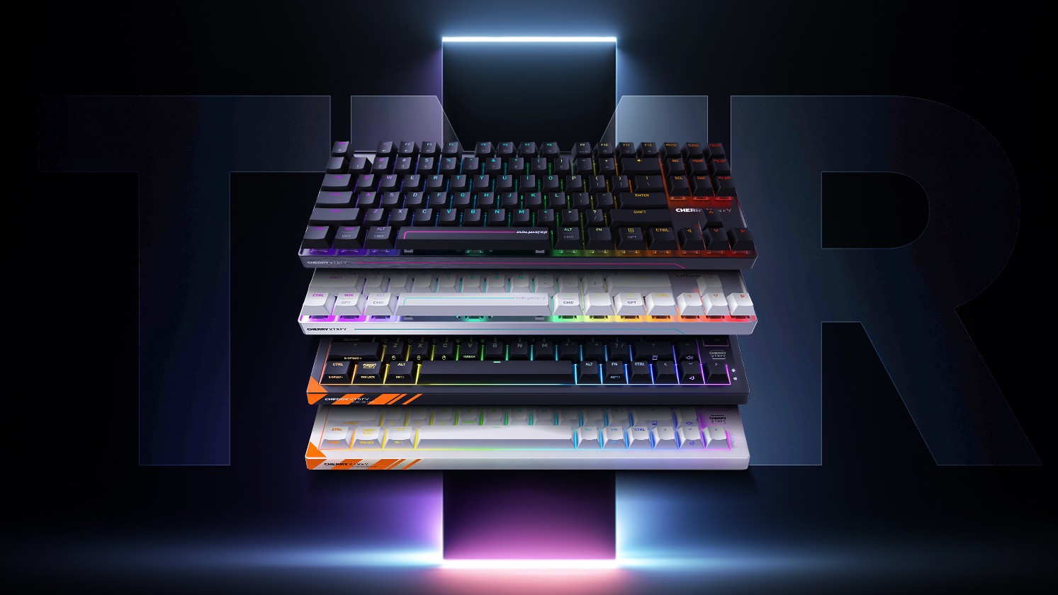 4 gaming keyboards stacked on top of one another with text in background reading TMR
