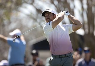 Xander Schauffele hits an iron shot at the Arnold Palmer Invitational