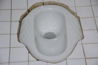 Squat toilet in Asia.