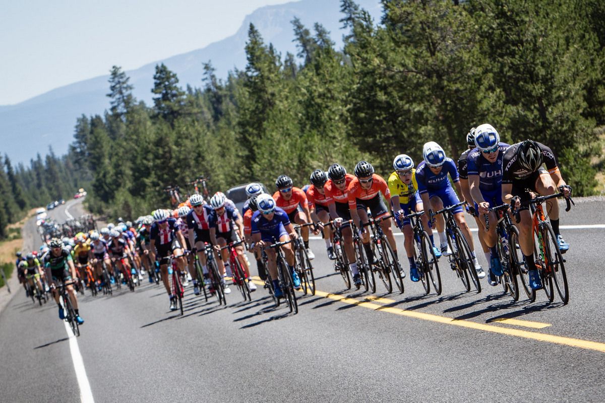 The front of the field goes single file to chase the break