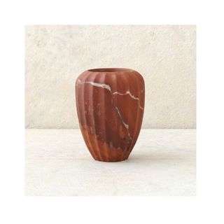 small fluted vase in red marble stone