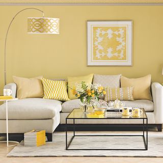 floor lamp living room with yellow room and pillows on sofa