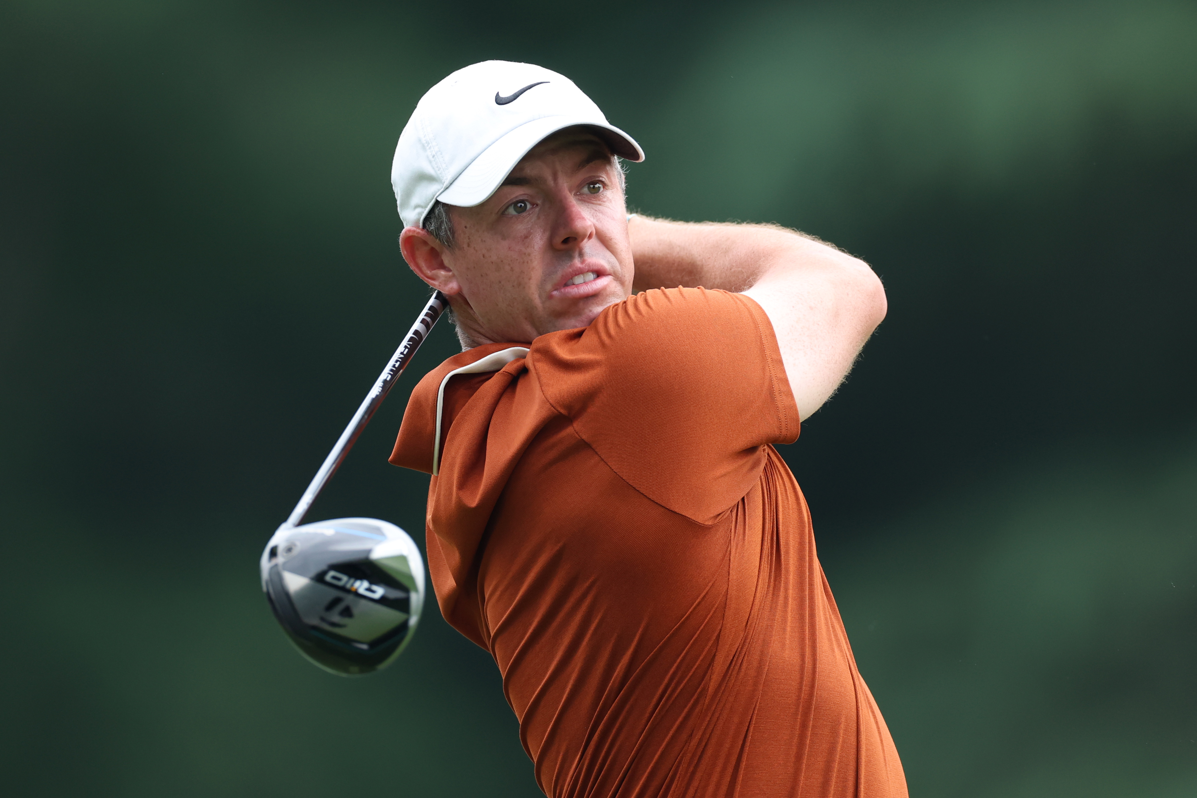 Rory McIlroy watches his tee shot