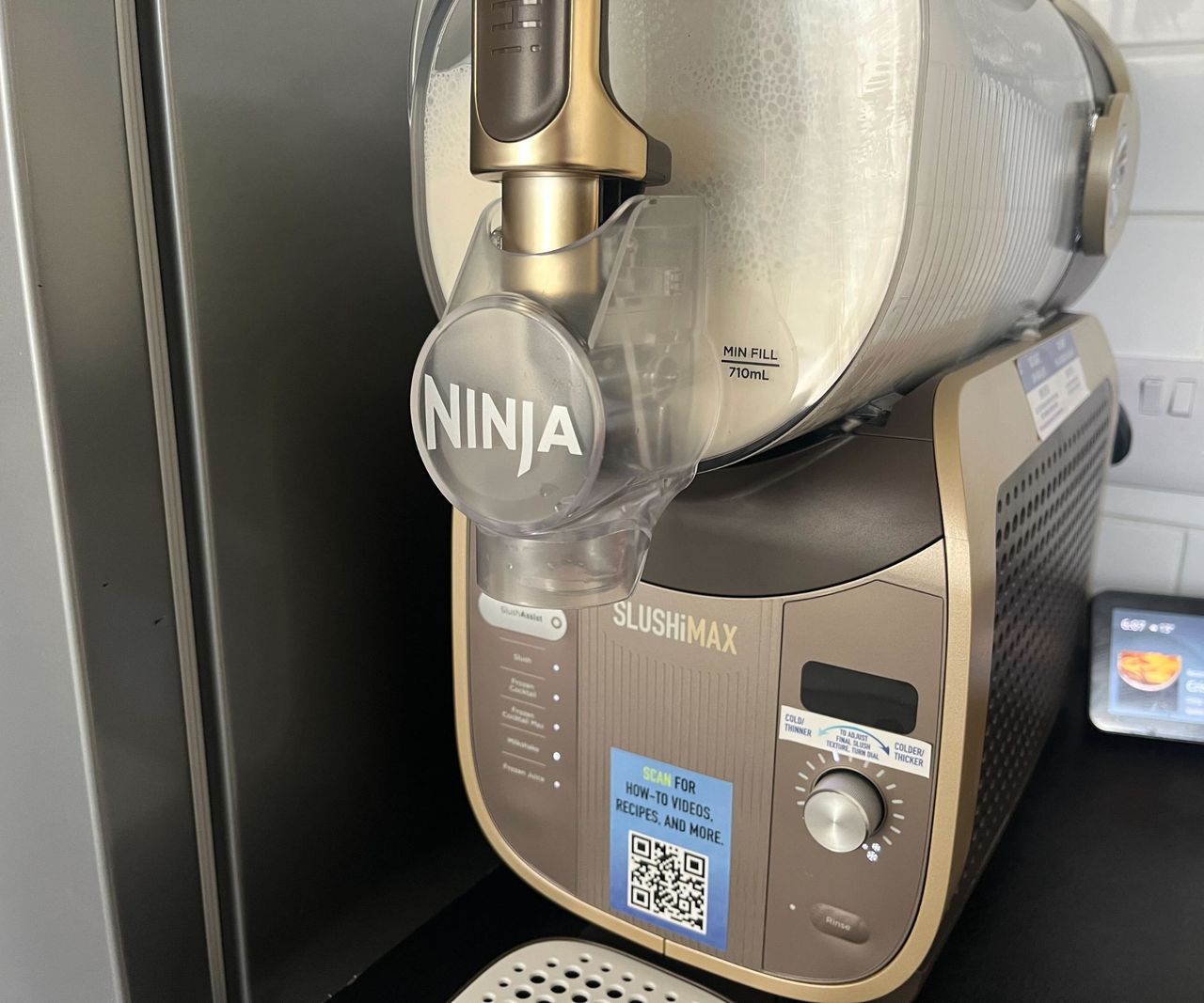Milkshake mixture being mixed in the Ninja SLUSHi max.