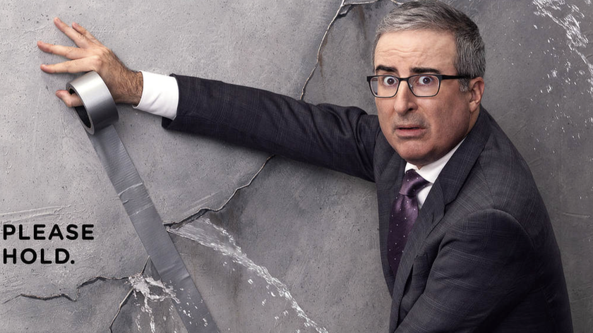John Oliver makes a worried face and holds gaffer tape to promote all the ways you can watch Last Week Tonight with John Oliver' season 13 in 2026