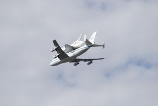 Shuttle Carrier Aircraft and Discovery over Blue Plains Advanced Wastewater Treatment Plant