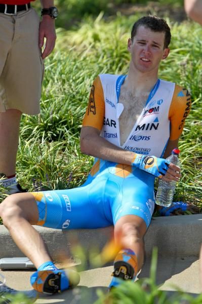 Peter Stetina (Garmin-Transitions) sits on a curb after his hard crash.