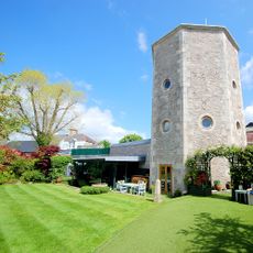 tall tower with green lawn