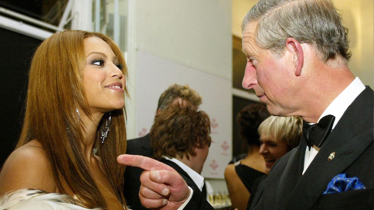 King Charles points at Beyonce at the Fashion Rocks concert and fashion show in aid of The Prince&#039;s Trust at the Royal Albert Hall in London on October 15, 2003