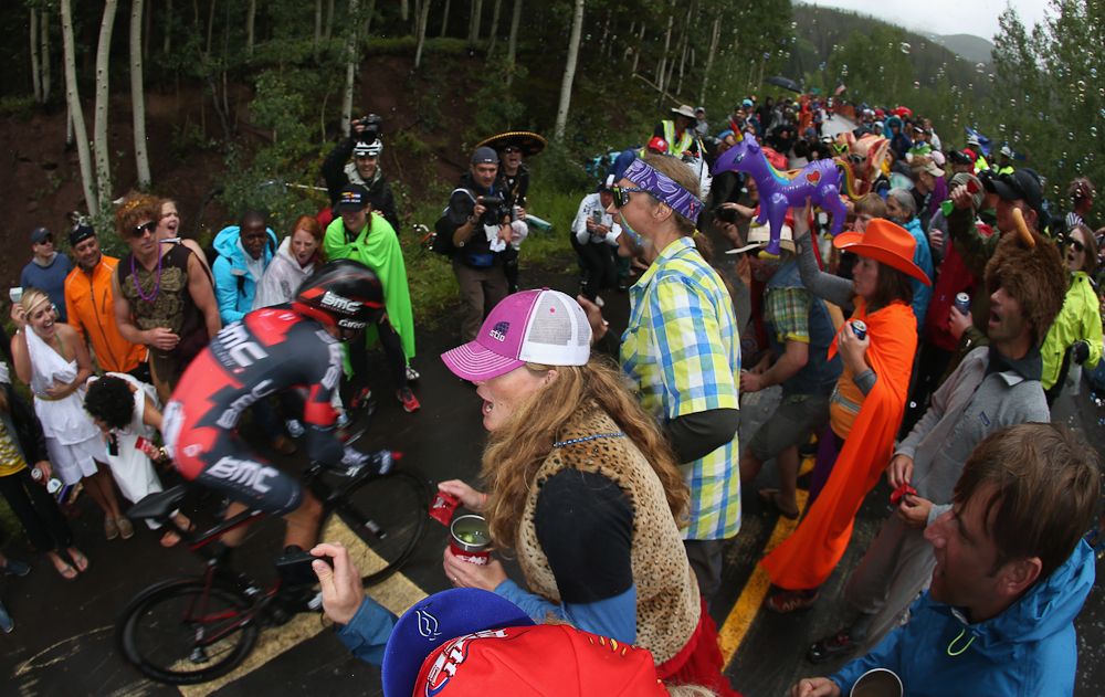 A rider makes his way through spectators at the Vail time trial during the USA Pro Challenge
