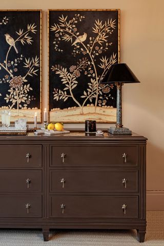 hallway with wooden console and artwork