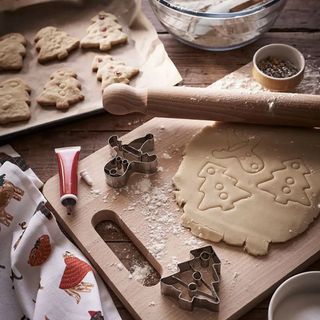Kitchen with Christmas baking on surface with gingerbread men.