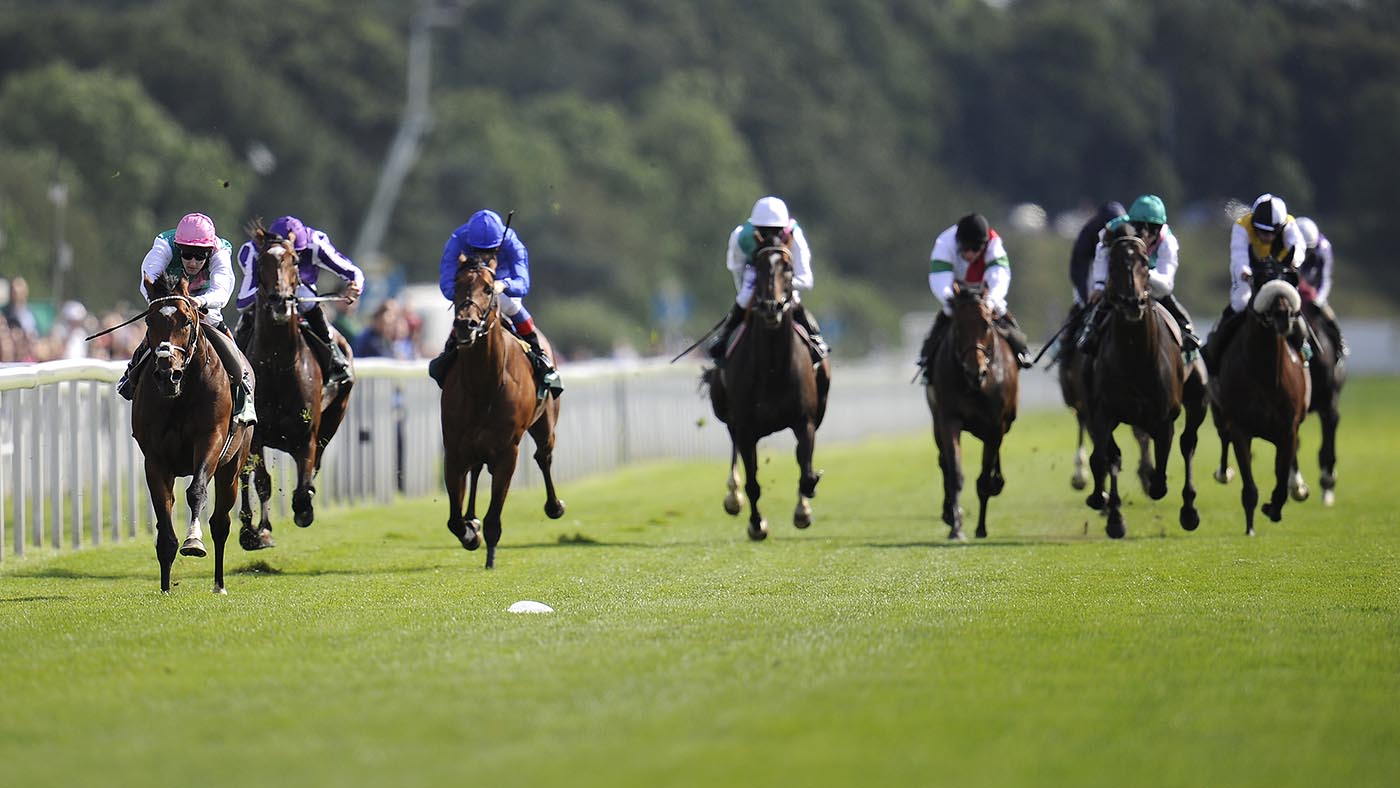 Tom Queally riding Frankel (left) win The Juddmonte International Stakes at York racecourse on August 22, 2012