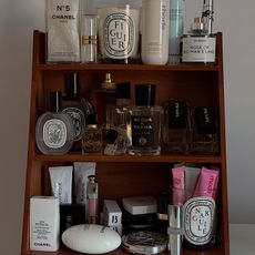 Photo of perfumes and skincare products on a vanity