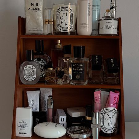 Photo of perfumes and skincare products on a vanity