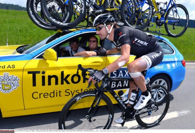 Fabian Cancellara has a chat to Bjarne Riis and Oleg Tinkoff