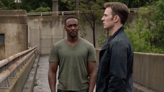 Steve Rogers (Chris Evans) and Sam Wilson (Anthony Mackie) stand outside in Captain America: The Winter Soldier