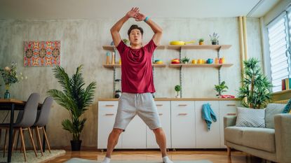 Man doing a high-intensity workout at home