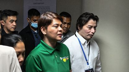 Sara Duterte arrives before the start of the impeachment trial at the Senate of the Philippines in Pasay, Metro Manila