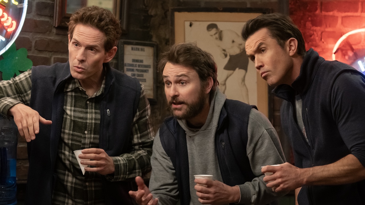 Dennis, Charlie and Mac holding drinks in Paddy's in It's Always Sunny in Philadelphia Season 17
