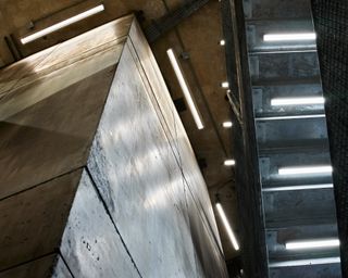 Raw concrete interior of Balenciaga New Bond Street store designed by Sub