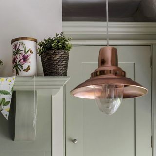 copper pendant light in kitchen