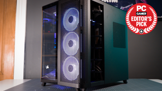 A Corsair Air 5400 PC case on a desk with various parts installed.