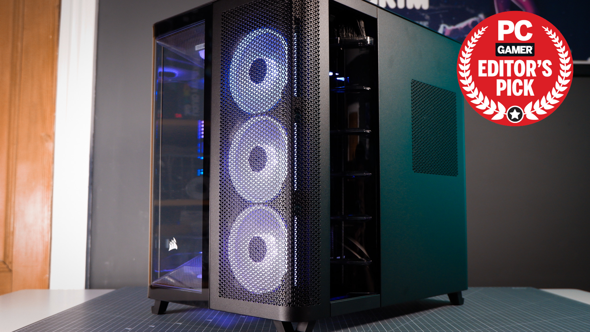 A Corsair Air 5400 PC case on a desk with various parts installed.