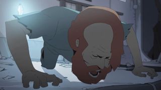 An anguished-looking, red-haired man is on all fours