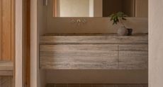 a minimalist natural bathroom vanity