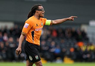 Barnet player manager Edgar Davids gives out orders to his team during the Skrill Conference Premier match between Barnet and Wrexham AFC at The Hive Stadium on October 13, 2013 in London, England.