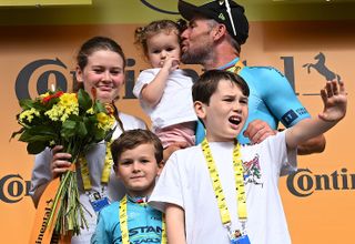 SAINT VULBAS, FRANCE - JULY 03: Mark Cavendish of The United Kingdom and Astana Qazaqstan Team celebrates at podium with his sons (Frey David, Finbarr and Delilah Grace) as stage winner during the 111th Tour de France 2024, Stage 5 a 177.4km stage from Saint-Jean-de-Maurienne to Saint Vulbas / #UCIWT / on July 03, 2024 in Saint Vulbas, France. (Photo by Dario Belingheri/Getty Images)