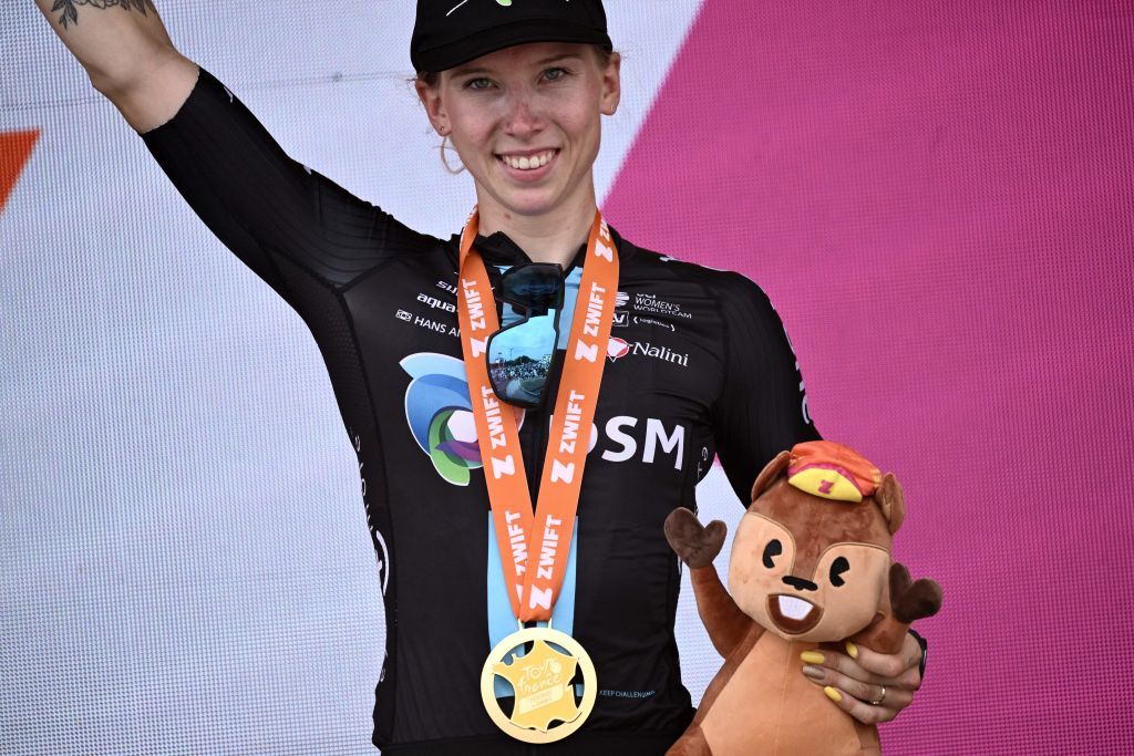 Team DSMs Dutch rider Lorena Wiebes celebrates on the podium after winning the 5th stage of the new edition of the Womens Tour de France cycling race 1756 km between BarleDuc and SaintDiedesVosges eastern France on July 28 2022 Photo by Jeff PACHOUD AFP Photo by JEFF PACHOUDAFP via Getty Images