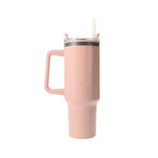 A pink drinking cup with a straw and handle