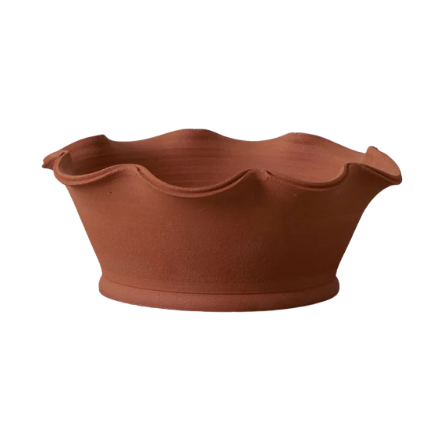 A terracotta planter with a scalloped edge from TOAST