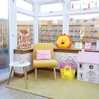 Playroom with doll house and jelly baskets