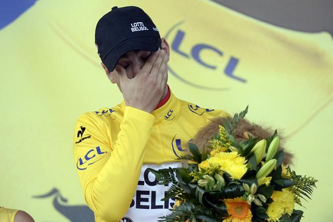 Tony Gallopin is overcome with emotion upon accepting the maillot jaune