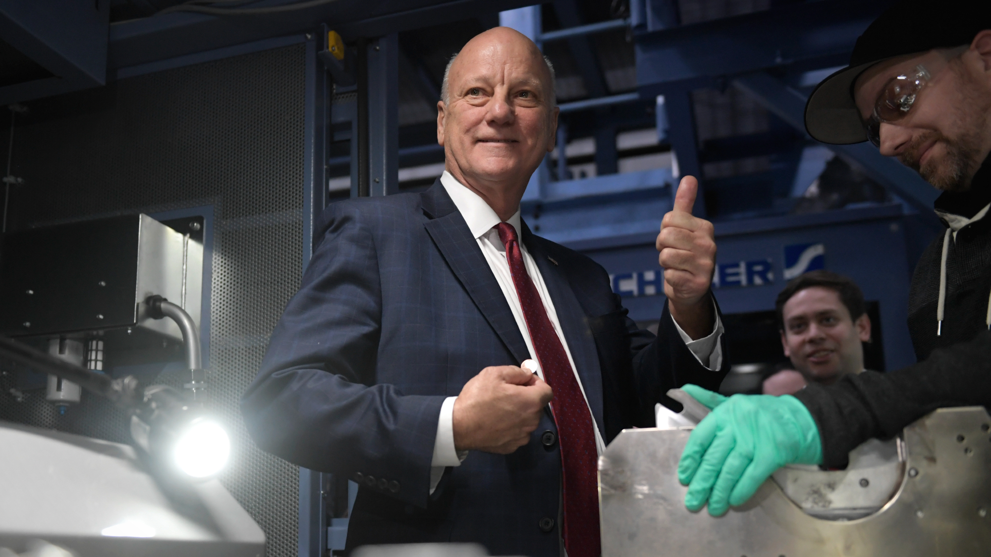 U.S. Treasurer Brandon Beach holds up final penny minted after 232 years