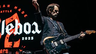 Peter Klett performs onstage with Candlebox