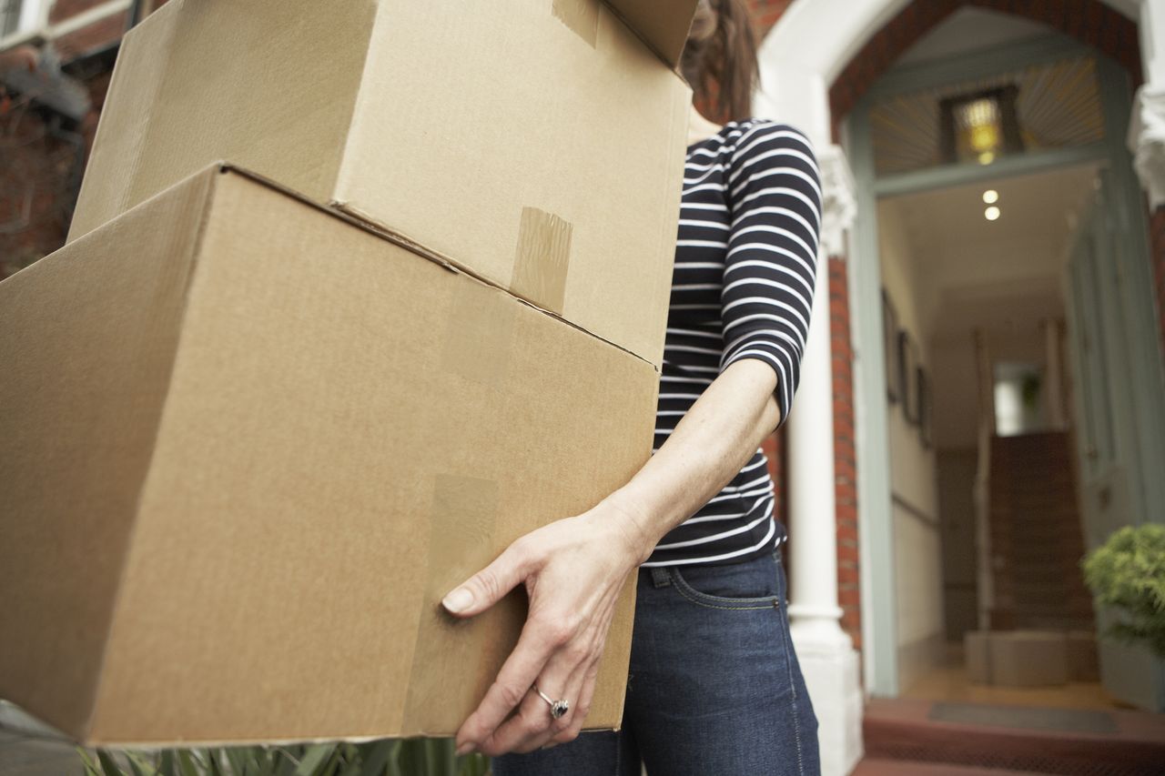 Person holding removal boxes