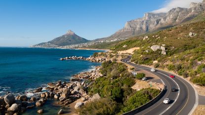 Cars drive on the Garden Route in South Africa