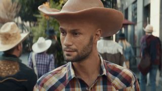 Man with Cowboy Hat-shaped head in Tubi Super Bowl ad