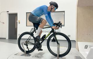 Josh rides in the wind tunnel aboard the baseline Trek Emonda bike, with deep-section aero wheels fitted