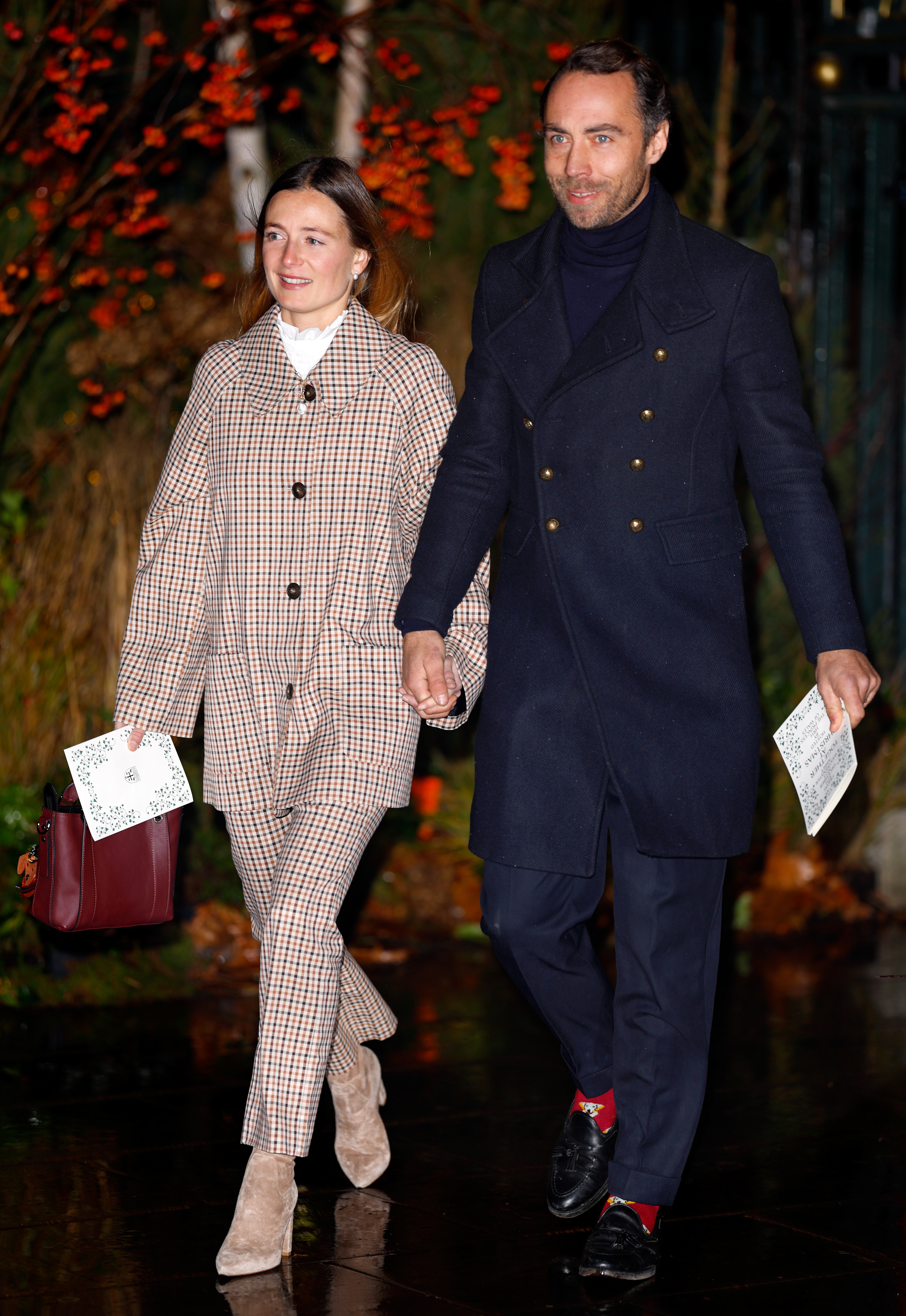 James Middleton holding hands with Alizee Thevenet at the Together at Christmas concert