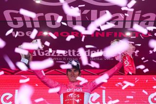 INEOS Grenadierss British rider Geraint Thomas celebrates his overall leaders pink jersey on the podium after the tenth stage of the Giro dItalia 2023 cycling race 196 km between Scandiano and Viareggio on May 16 2023 Photo by Luca Bettini AFP Photo by LUCA BETTINIAFP via Getty Images