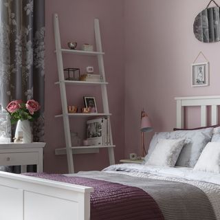 bedroom with ladder shelf