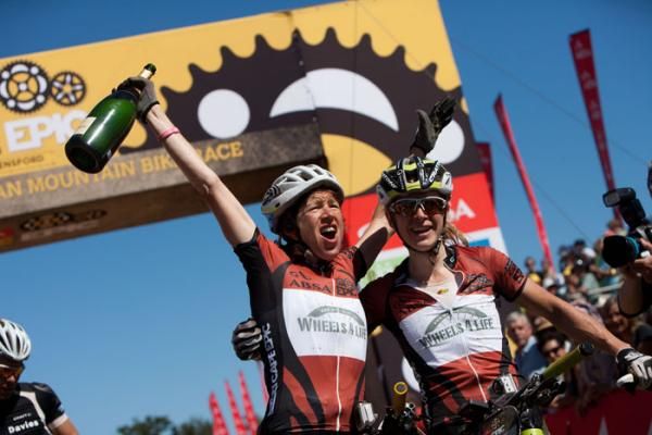 Winners Esther Suss and Sally Bigham of Wheels4life celebrate after finishing the final stage