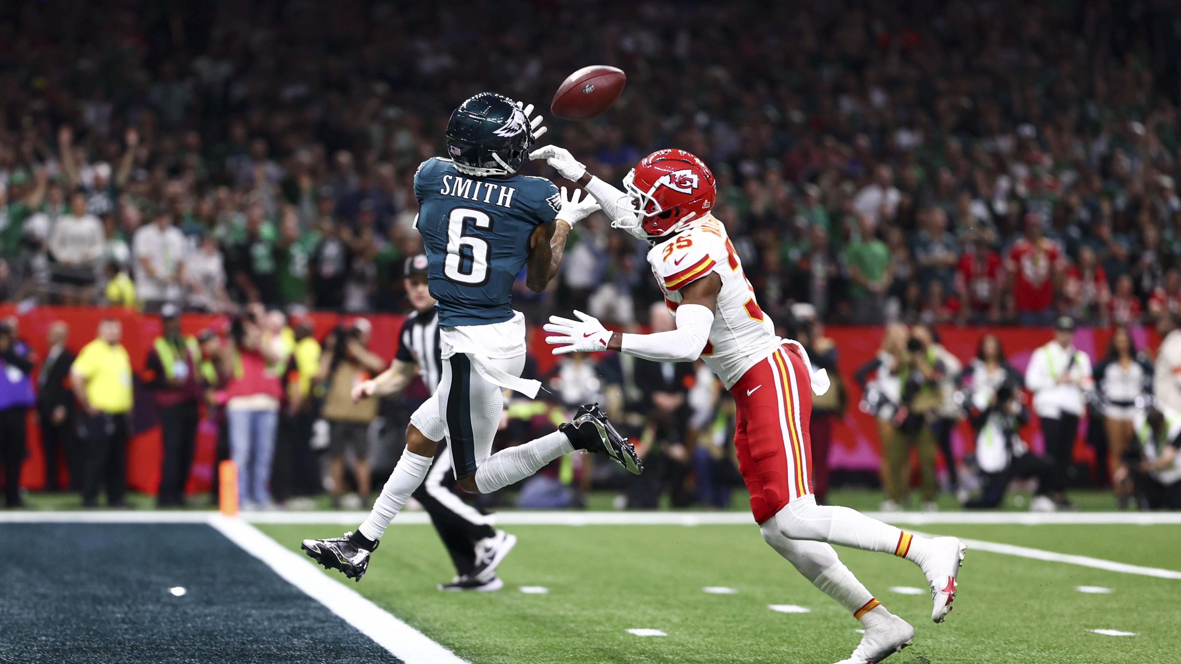 DeVonta Smith #6 of the Philadelphia Eagles catches a touchdown pass against Jaylen Watson #35 of the Kansas City Chiefs in the second half during Super Bowl LIX at Caesars Superdome on February 9, 2025 in New Orleans, Louisiana.