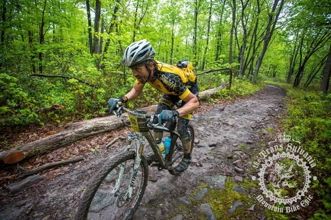 Dax Massey powering down the rock-strewn doubletrack.