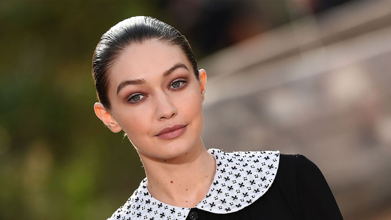 US model Gigi Hadid presents a creation by Chanel during the Women&#039;s Spring-Summer 2020/2021 Haute Couture collection fashion show at the Grand Palais in Paris, on January 21, 2020. - The Grand Palais was turned into the garden of the Cistercian abbey in Aubazine, central France, where Gabrielle &quot;Coco&quot; Chanel grew up. (Photo by CHRISTOPHE ARCHAMBAULT / AFP) (Photo by CHRISTOPHE ARCHAMBAULT/AFP via Getty Images)